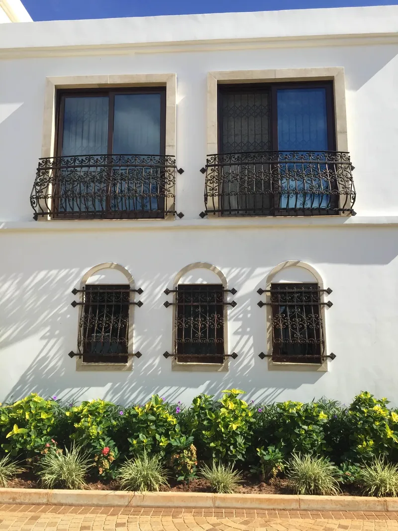 Forged balcony railings, window grilles and gallery on a villa, Dar es Salaam