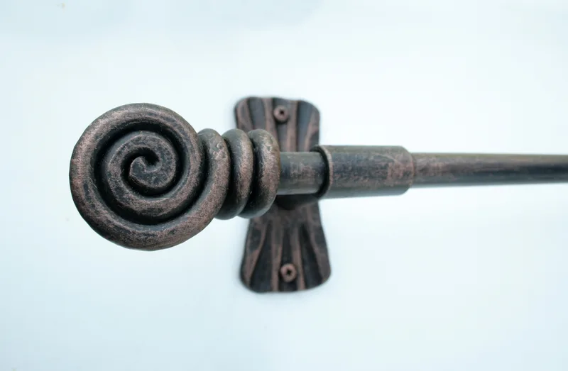 Geschmiedete Gardinenstange „Schnecke“