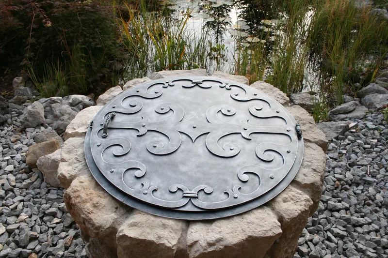 Forged Well Cover