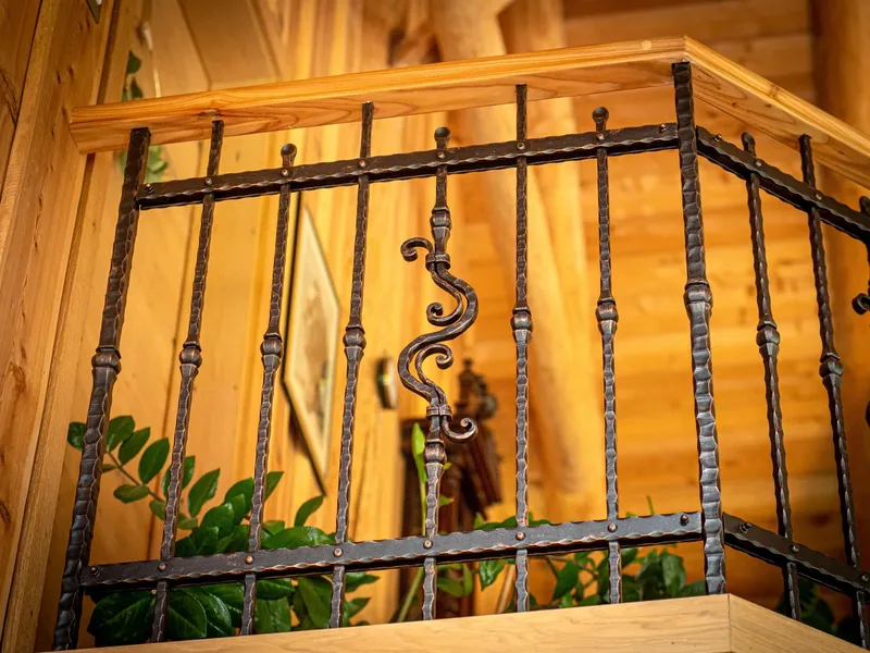 Wrought iron stair and gallery railing, Škrilje