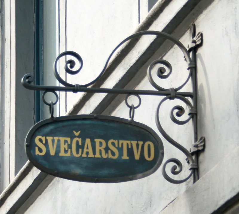 Geschmiedetes Schild „Wachszieherei“