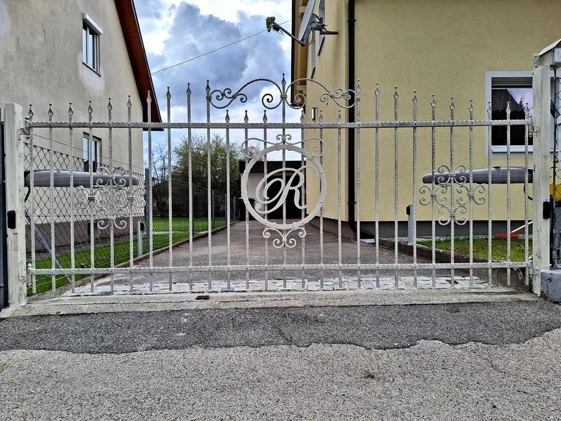 Sliding Gate with Monogram