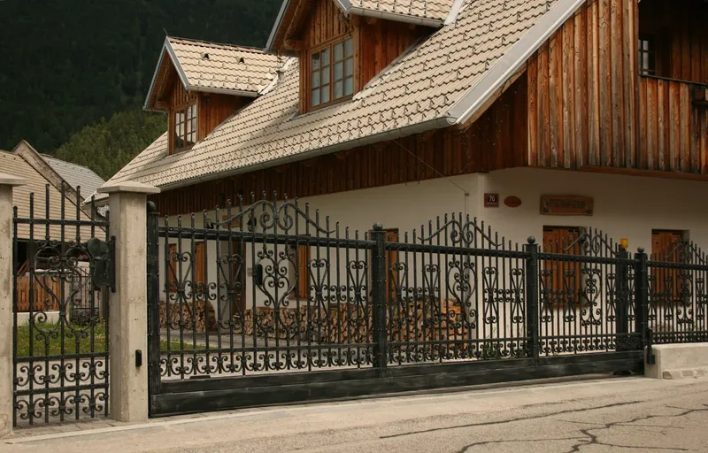 Wrought iron sliding gate and garden fence, Kranjska Gora